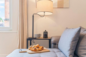 Central 2 bedroom Home and Street Parking